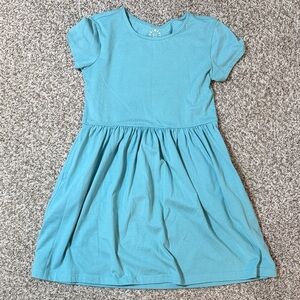Girls' Primary Teal Short Sleeve Knit Dress with Pocket. Size 8/9